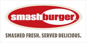 A logo for smashburger, with the name of the restaurant in red.